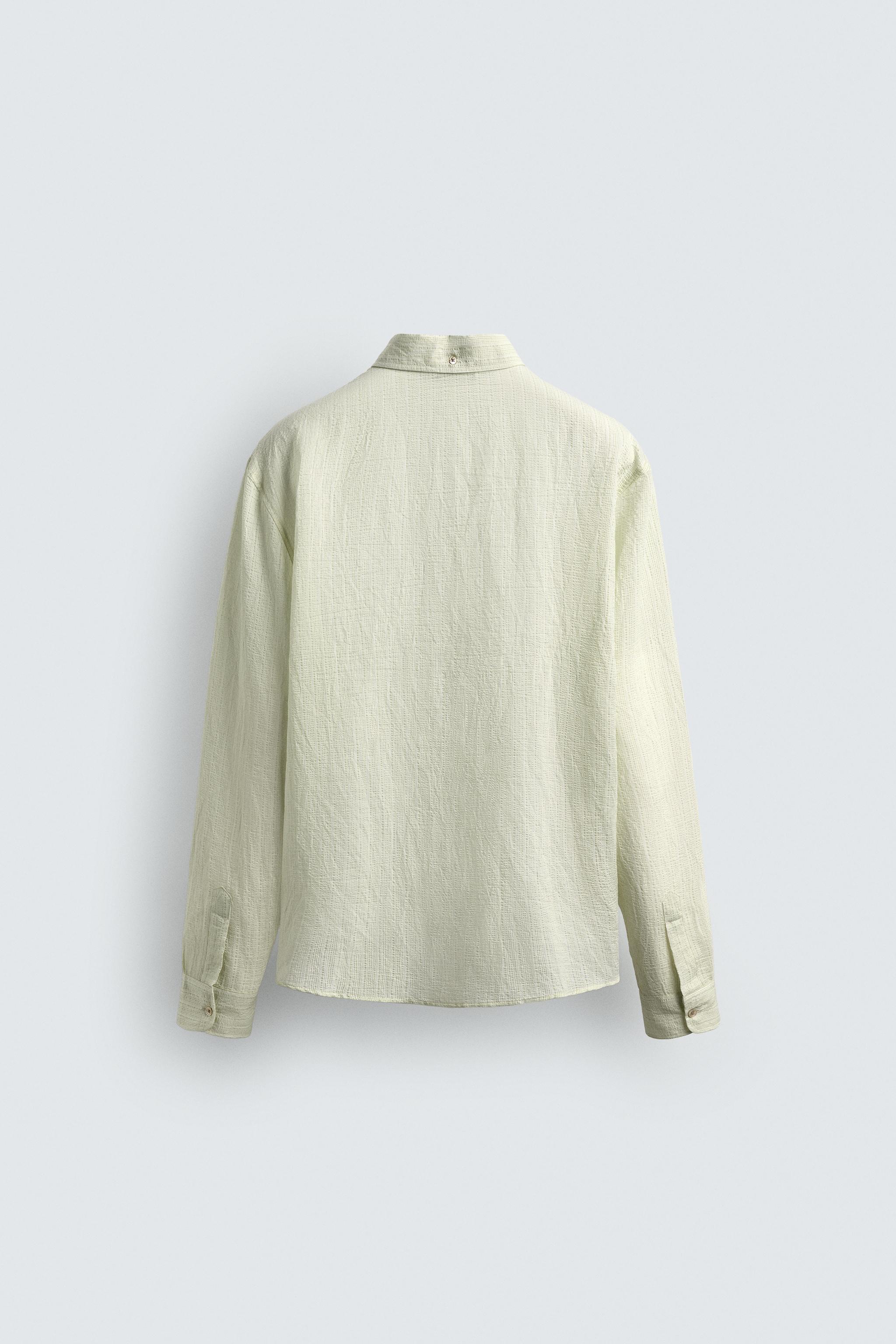 RELAXED FIT STRUCTURED FLOWY SHIRT